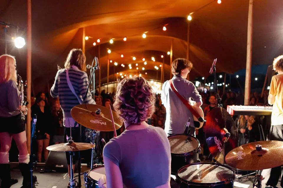 Casual Smart a band with 5 members perform on the Settlement Stage