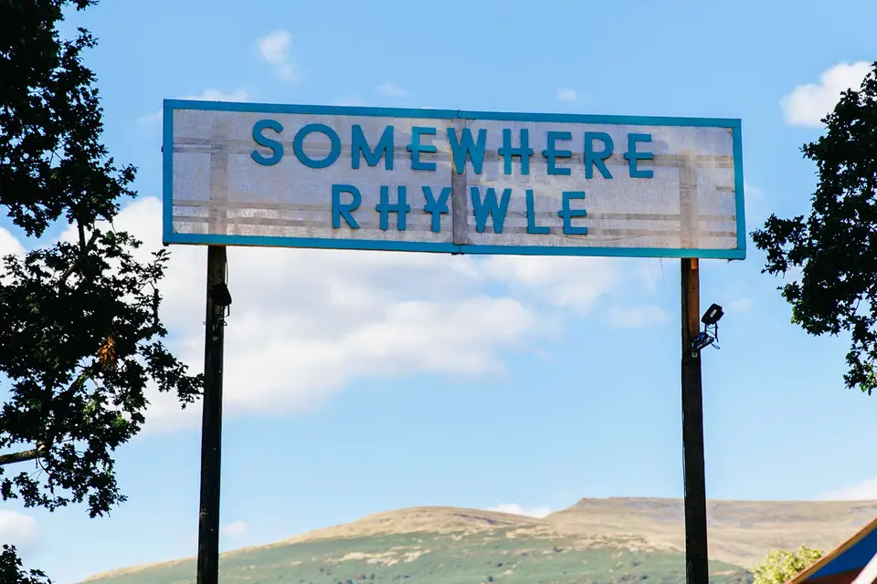 the sign for somewhere