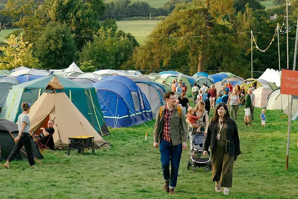 People arriving to the campsite at Green Man Festival