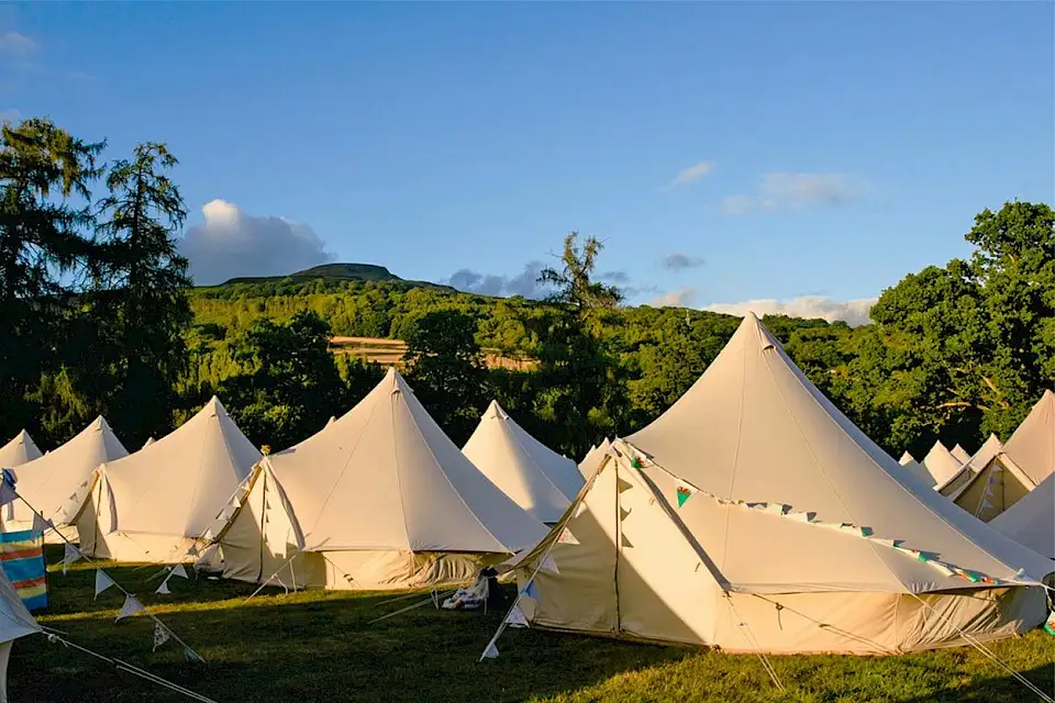 Bell tents at Green Man with the afternoon sun