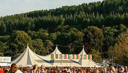 The Mountain Bar tent with trees rising up behind on the Black Mountain