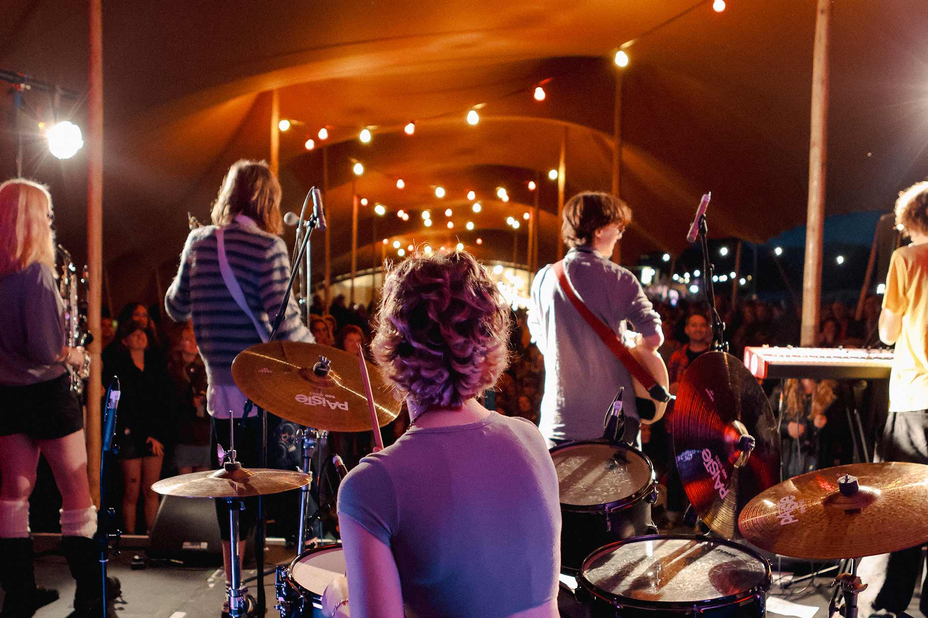 Casual Smart a band with 5 members perform on the Settlement Stage