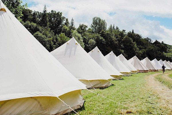 Luxury bell tents in a field