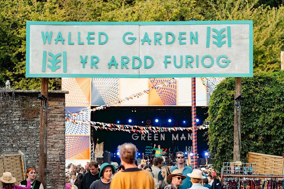 The walled garden sign, you can see the stage in the background