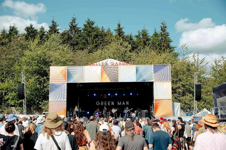 a band perform on the walled garden stage