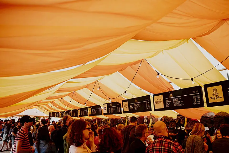 the inside of the courtyard tent. there are lots of beer options