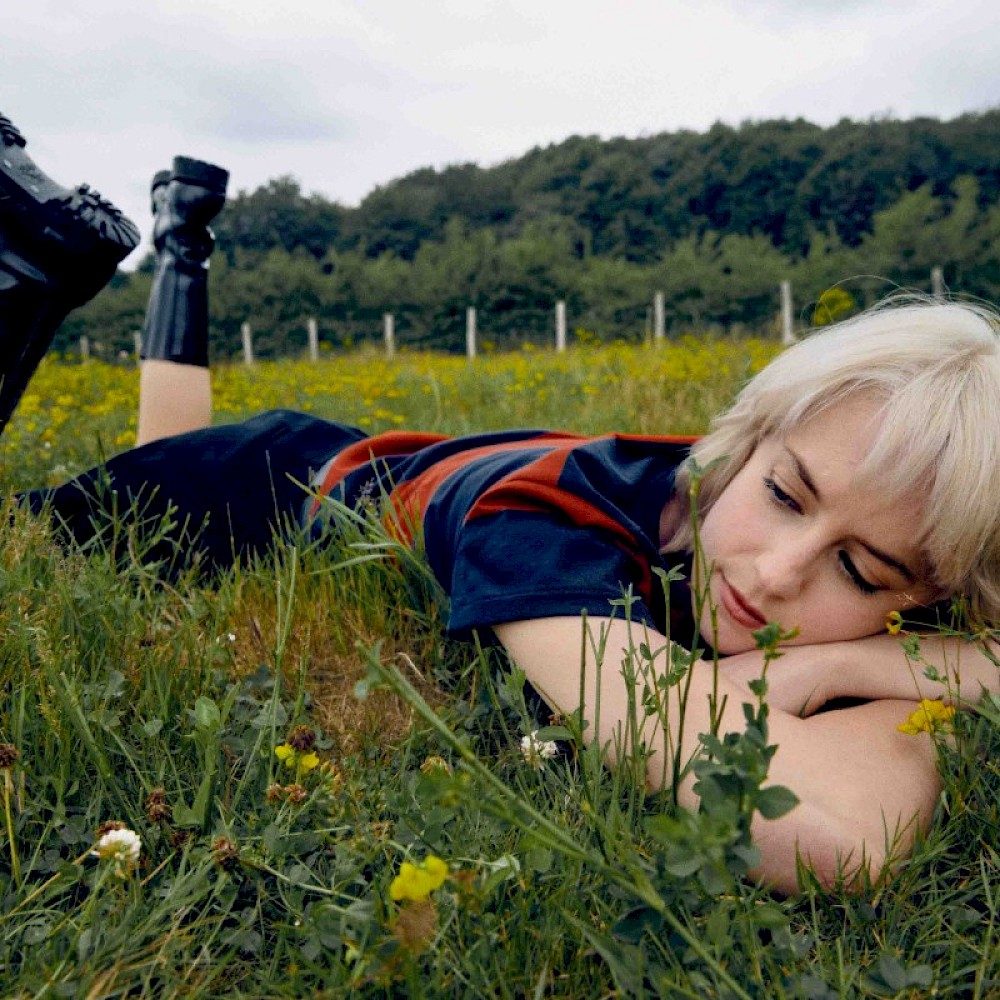 Avalon Emerson in the grass