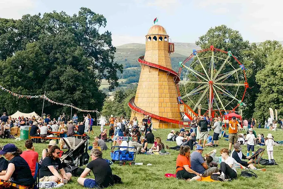 The helter skelter and a ferris wheel in the Far Out field
